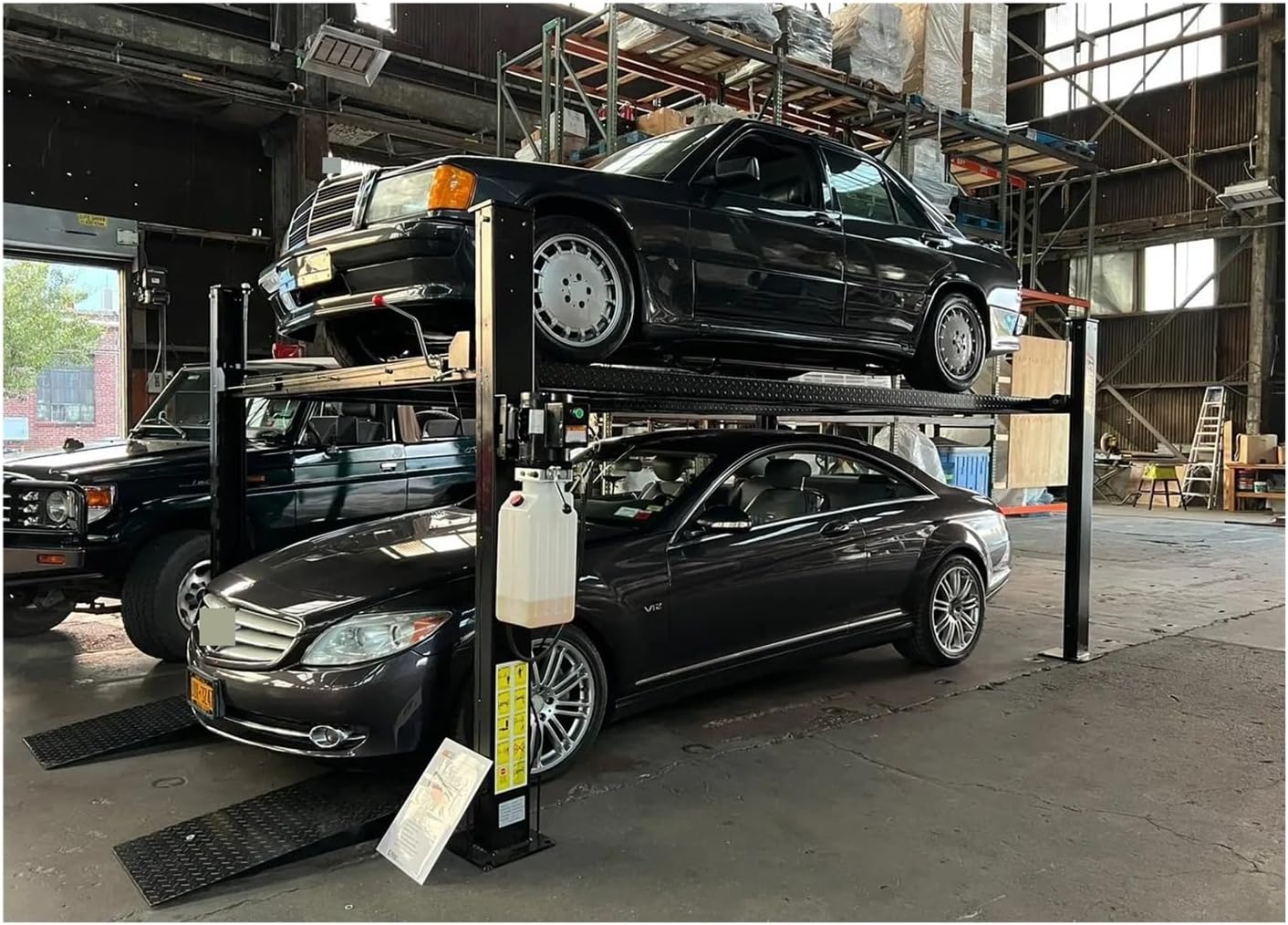 buy 4 post car lift,should I buy a 4 post car lift,4 post car lift worth buying,best 4 post car lift for home garage,4 post car lift pros and cons,4 post vs 2 post car lift performance testing and real-world results
