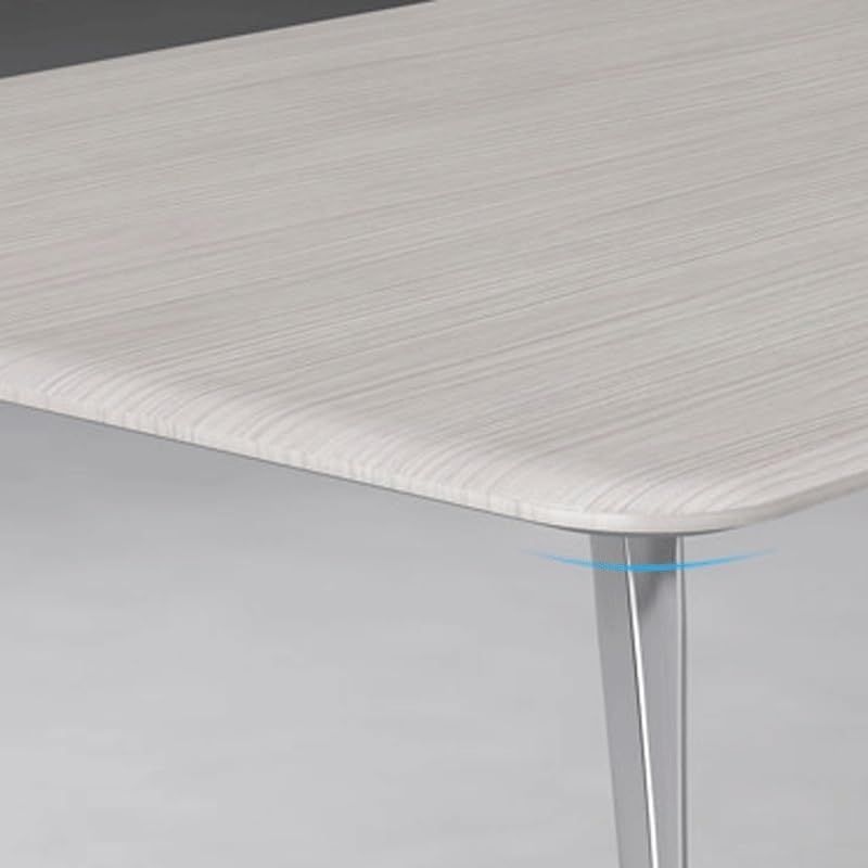 Real-world testing scenario of the XVBGTRW conference table in a home office setting, showing stability and ergonomic use