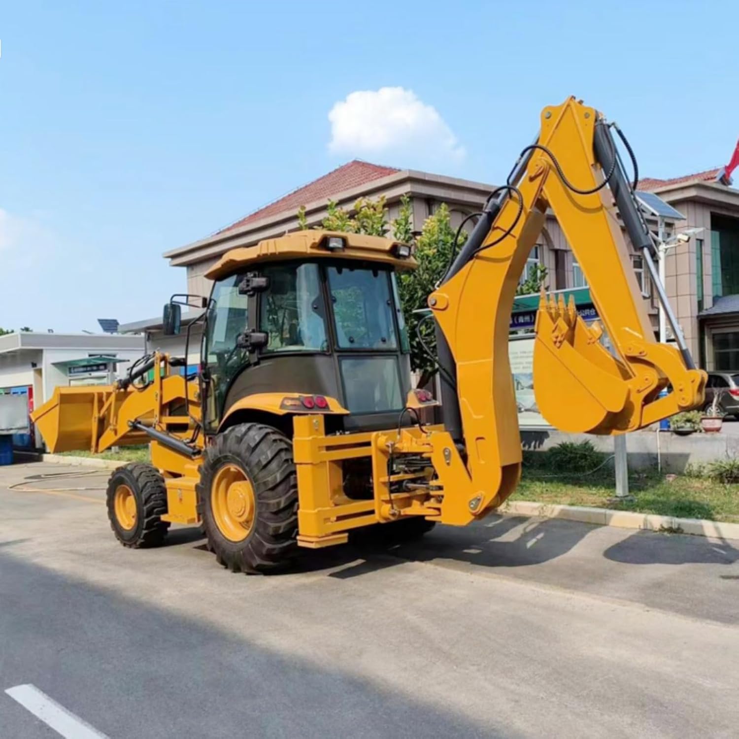 Detailed look at the features of the best compact backhoe loader, highlighting its 2-in-1 design and compact backhoe loader pros cons for residential use