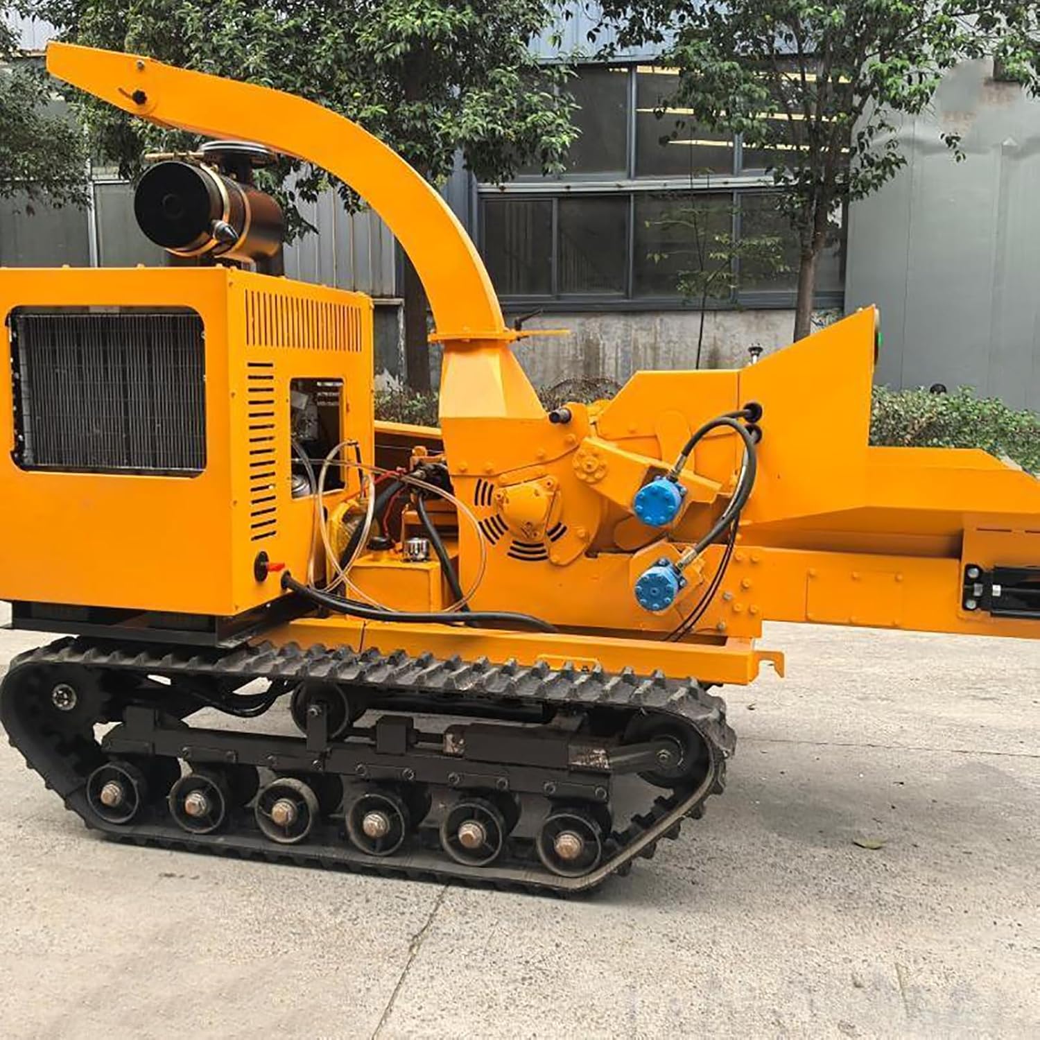 tracked wood chipper shredder pros cons,should I buy a tracked wood chipper,tracked wood chipper vs towable,heavy duty wood chipper for orchards,best rough terrain wood chipper shredder,wood chipper worth buying performance testing and real-world results